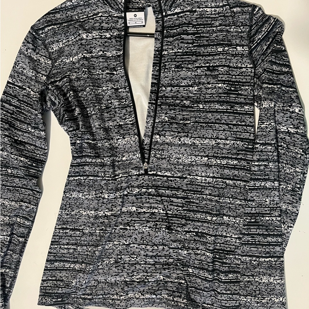 Nike Pro dry fit, medium long sleeve authentic wear, with warm inside.